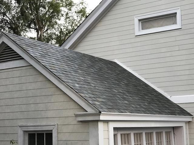 Tesla Solar Roof tiles on a detached house